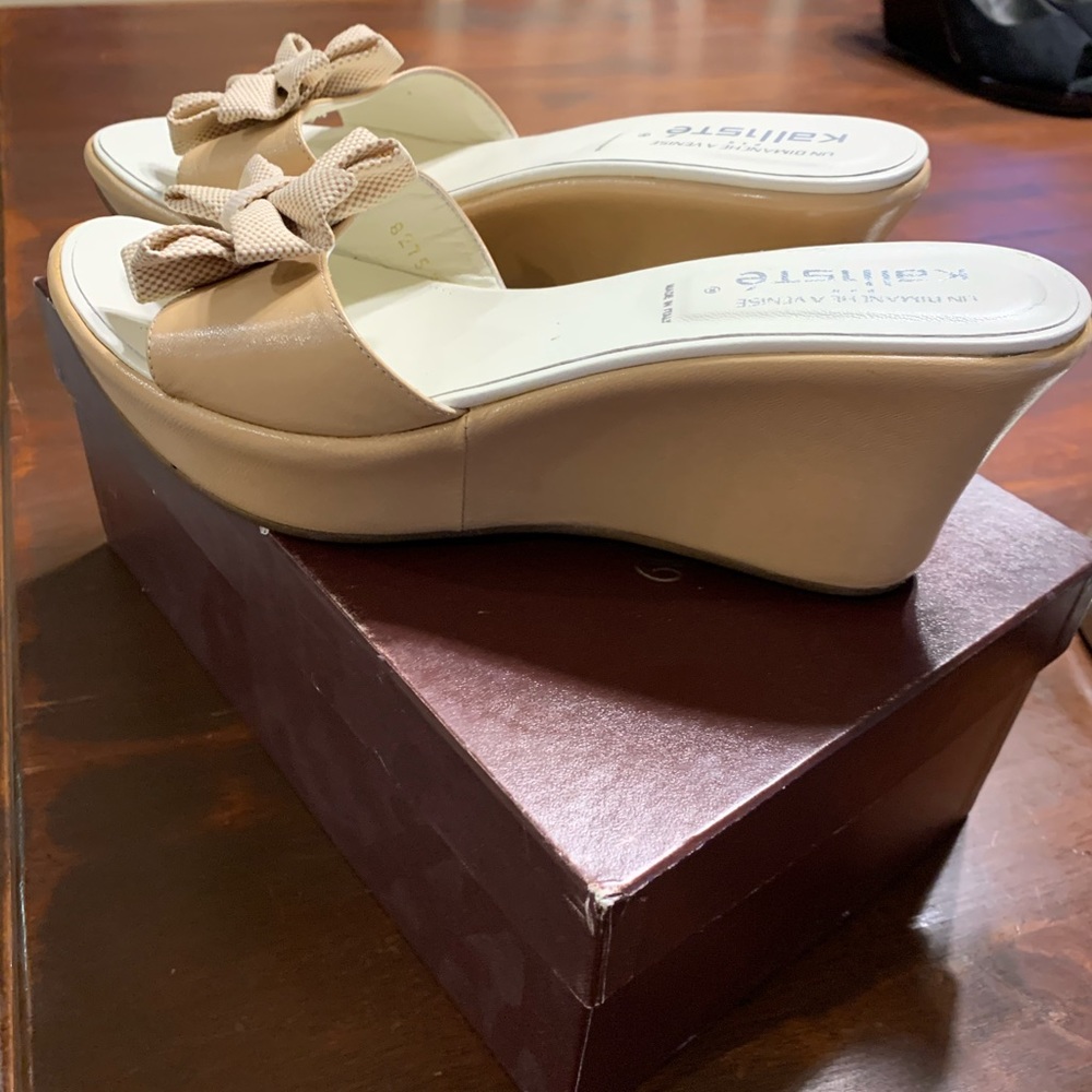 Beige platform bow detail sandals bought in Rome.